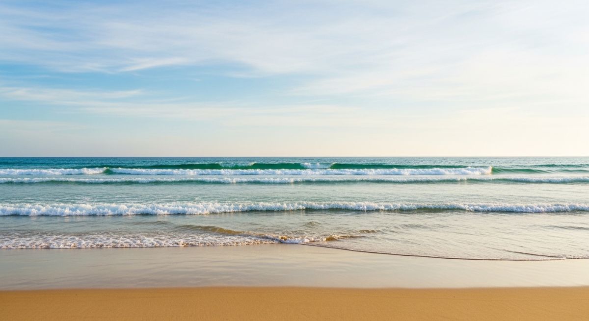 Calm waves washing onto a peaceful beach.